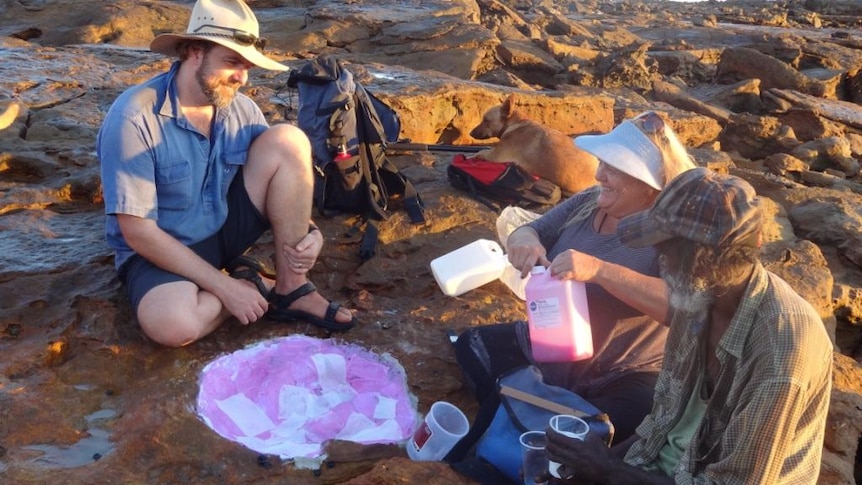 Steve Salisbury, Louise Middleton, Richard Hunter make a cast of a theropod footprint in the Kimberley.