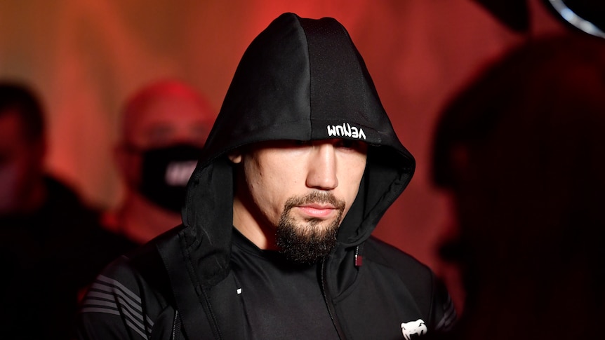 Robert Whittaker walks out to fight Kelvin Gastelum in a middleweight fight