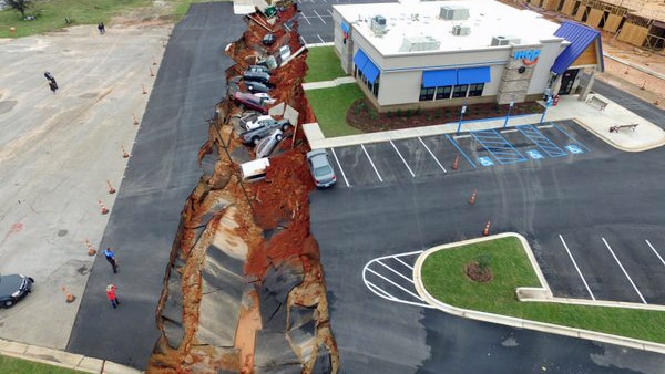 The sinkhole runs from the front of the restaurant all the way to a creek about 180 metres away.