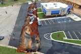 The sinkhole runs from the front of the restaurant all the way to a creek about 180 metres away.