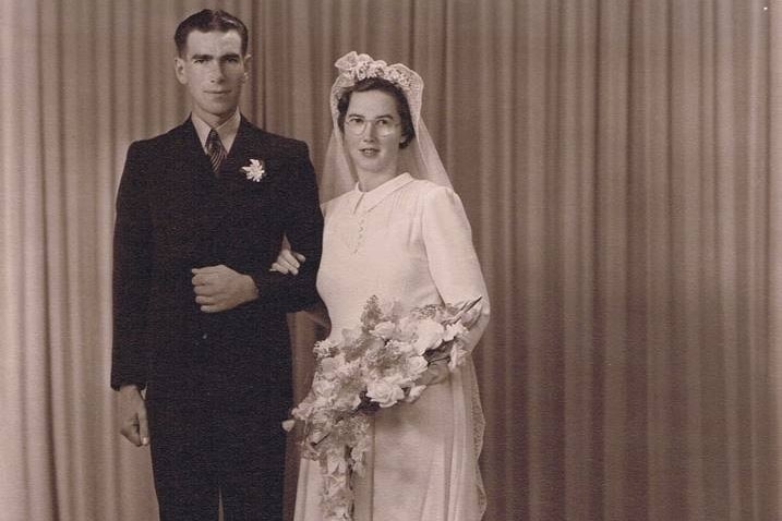 Black and white photo of couple on wedding day