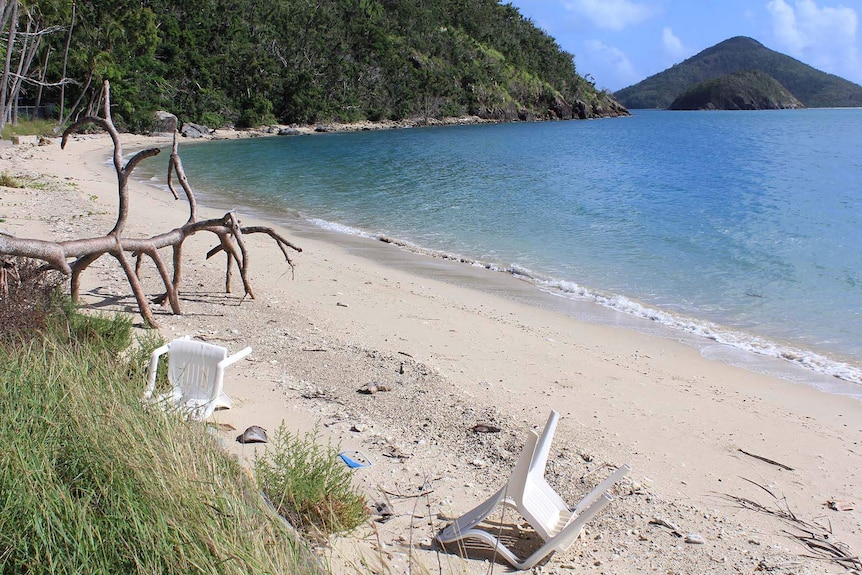 Old plastic chairs litter a beach on South Molle Island off north Queensland.
