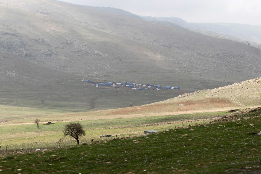 Tents where displaced Yazidi families live are seen near Sinjar.