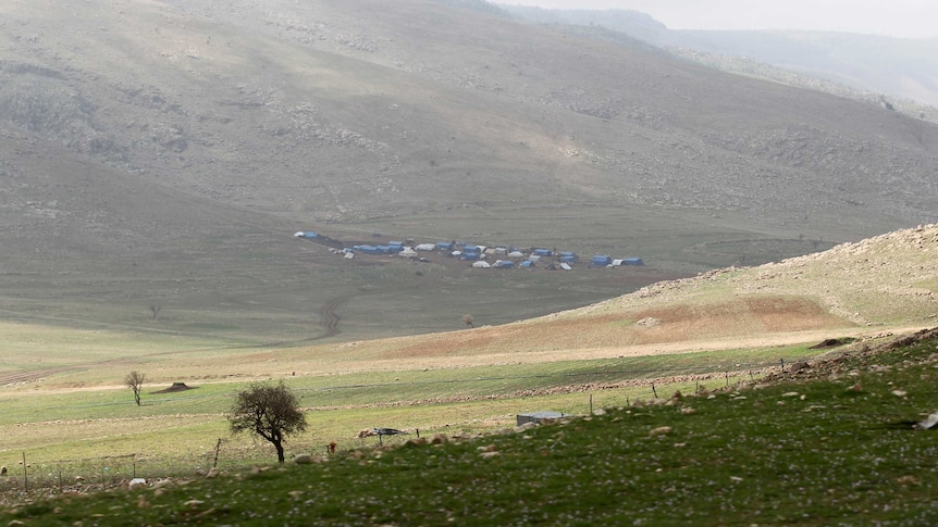 Tents where displaced Yazidi families live are seen near Sinjar.