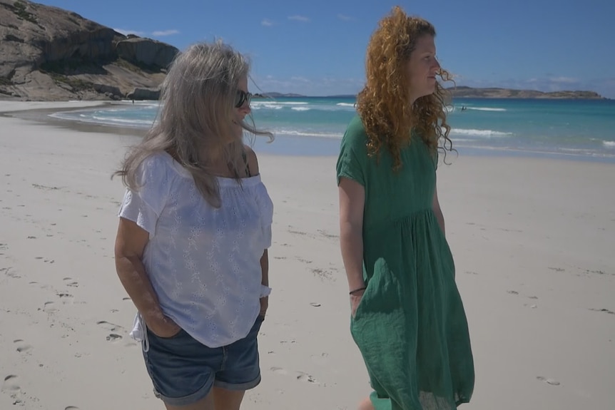 Karen Milligan and her daughter Hannah Milligan walk on Esperance's West Beach