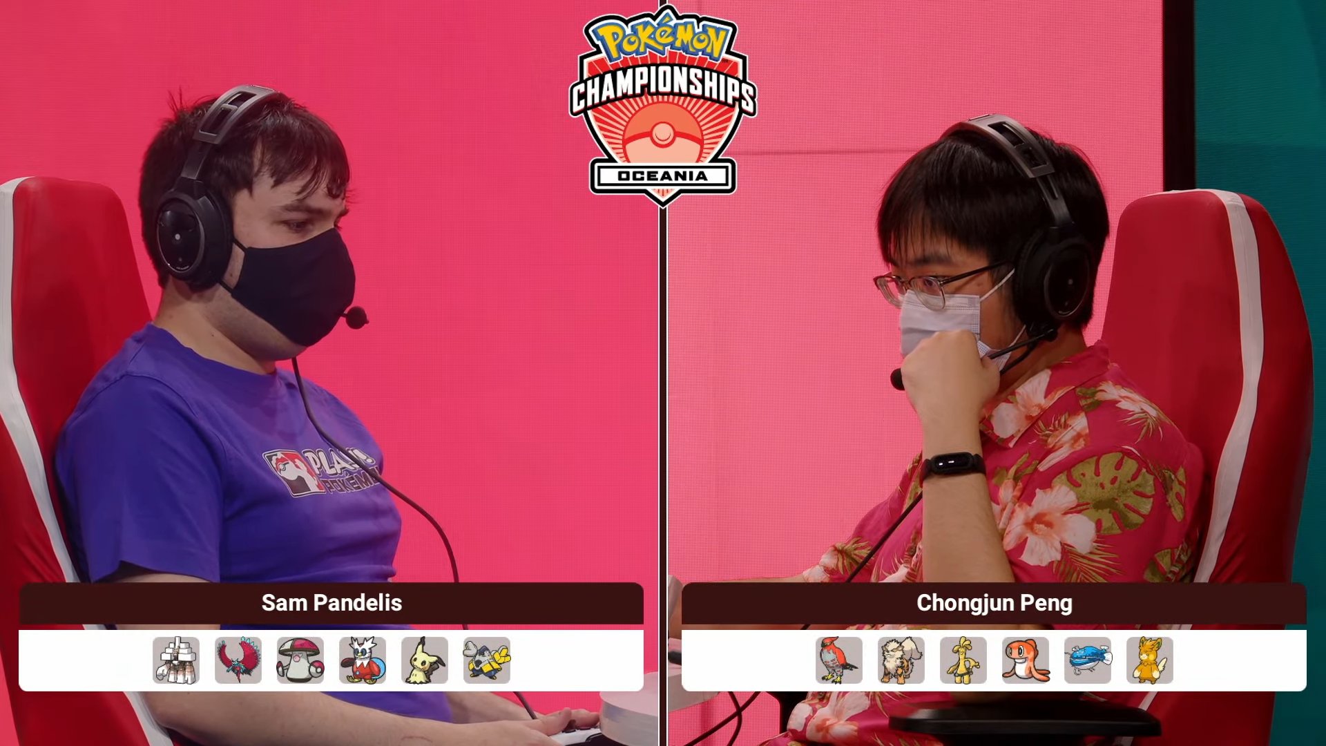 Two men with face masks playing a pokemon battle