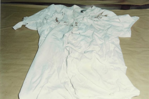A white shirt with red stains