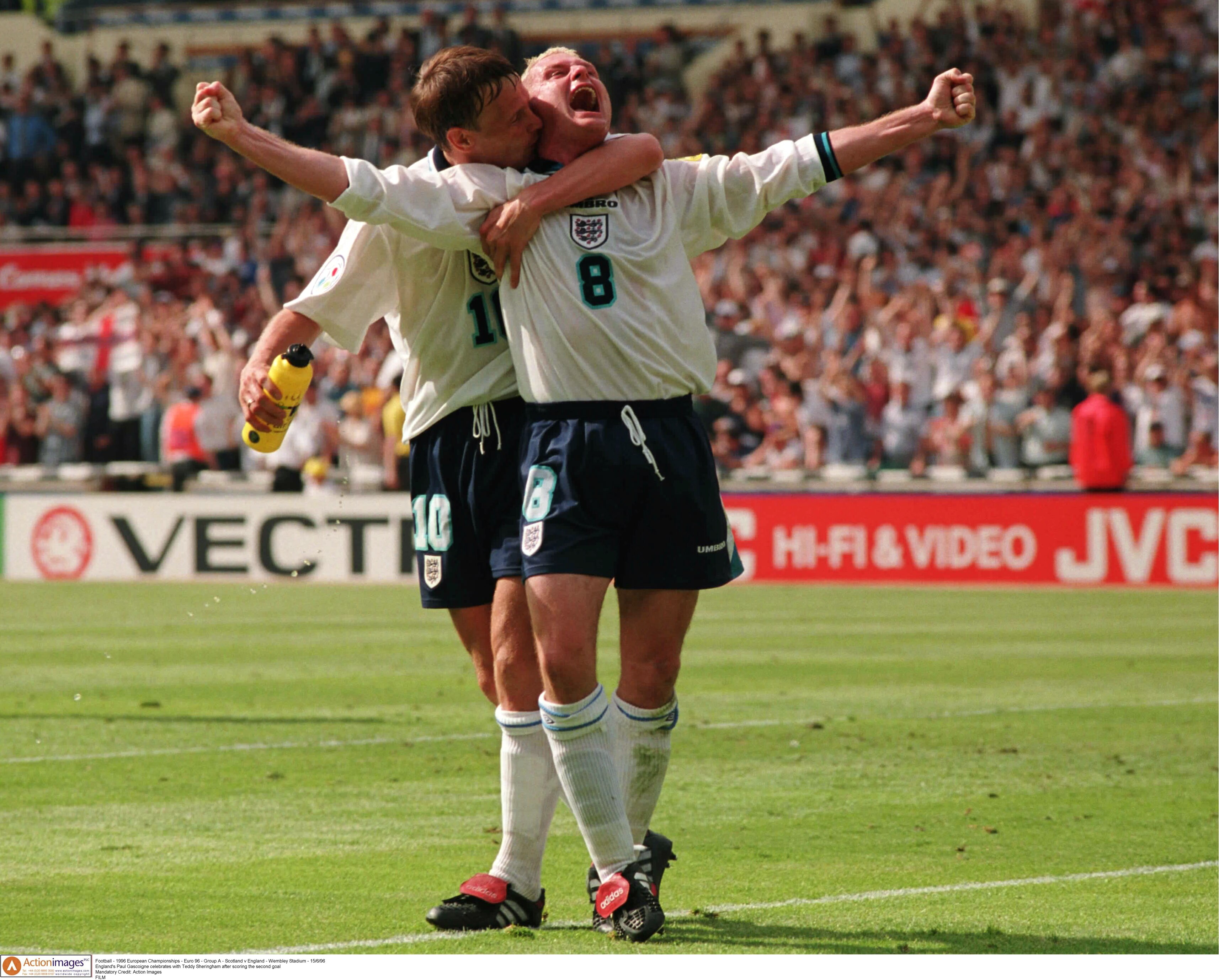 Paul Gascoigne is hugged by Teddy Sherringham. 