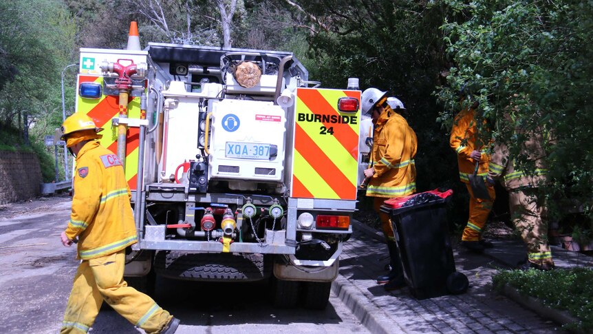 CFS crews help residents clear flood water from homes.