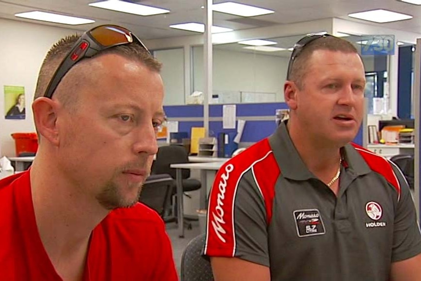 Holden workers Mark Wells (left) and Peter Milich