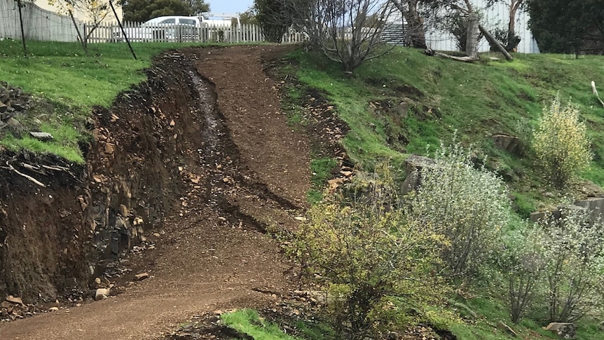 Erosion at the site of a proposed walking trail.