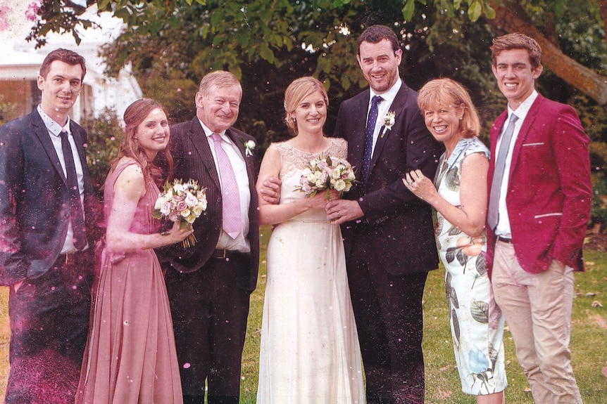 Kate Sinclair with son George on her right, and her stepchildren and son-in-law at a wedding.