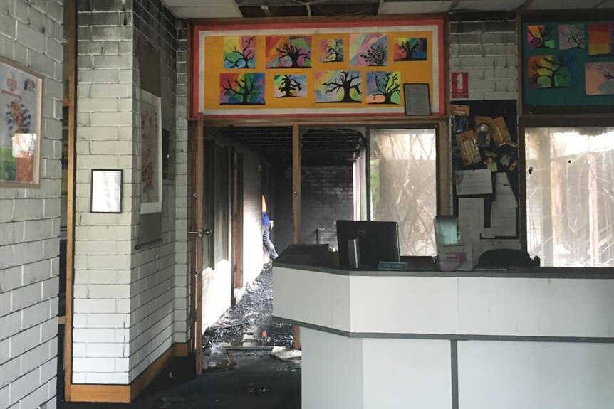 Fire damage is evident in the school office area
