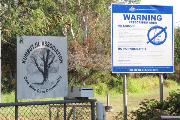 Signs outside One Mile Dam community, near Darwin.