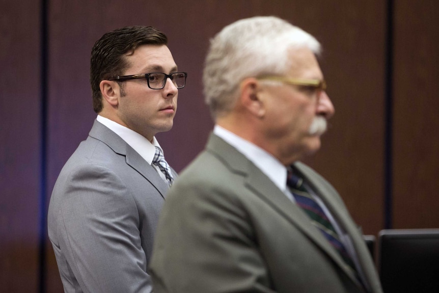 Former Mesa police officer Philip Brailsford stands for the jury at the start of the trial