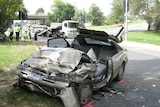 The remains of a car involved in a police chase which left four people, including a four-month-old c