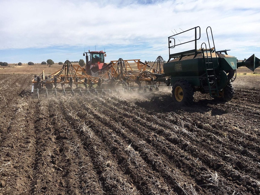 Tractor in a dry field