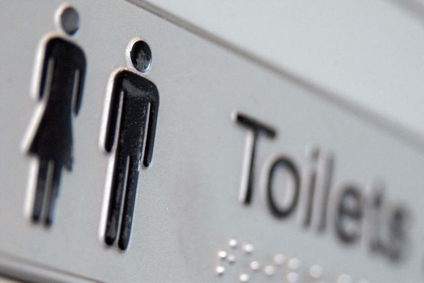 Toilet sign depicting male or female symbols