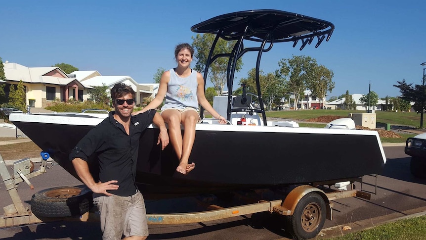 A couple enjoys their new DIY boat