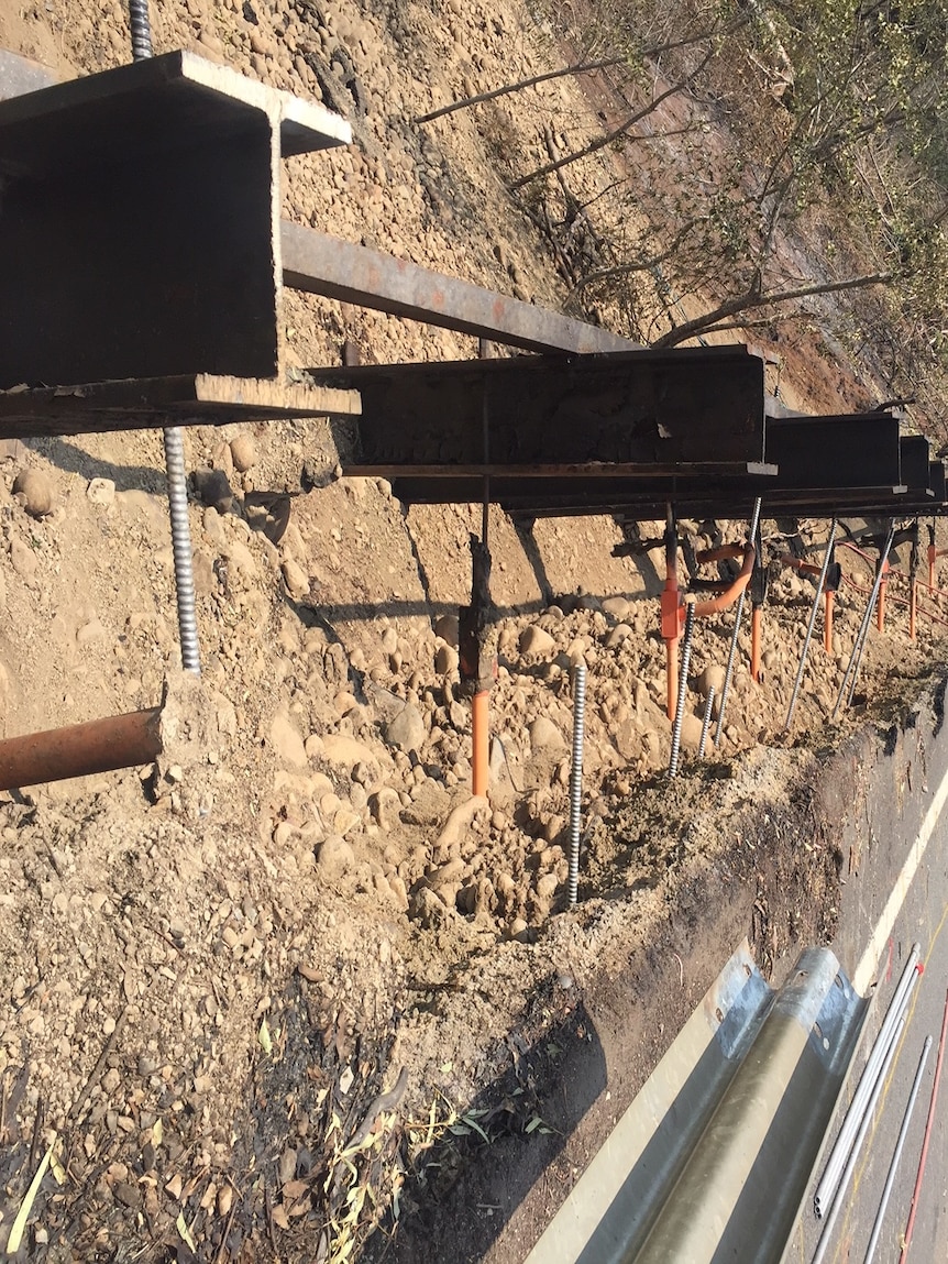 Progress shot of the repair of a retaining wall.