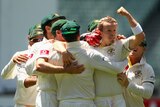 Peter Siddle fired up after taking a wicket with team-mates
