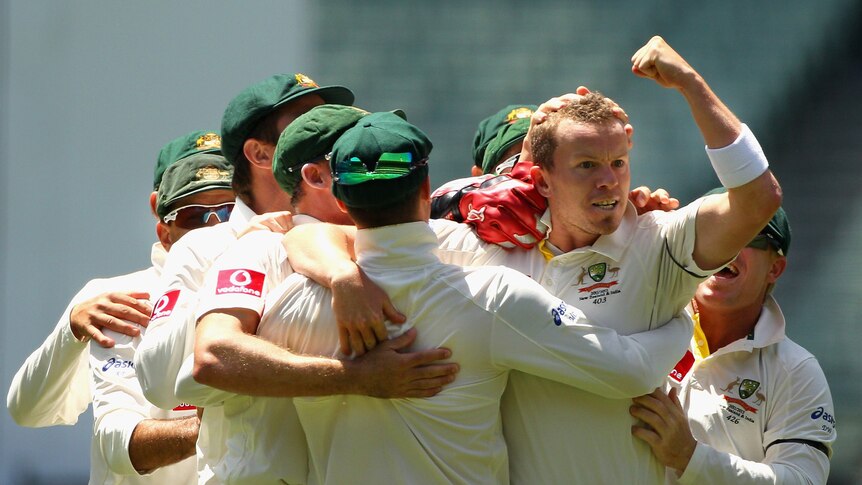 Peter Siddle fired up after taking a wicket with team-mates