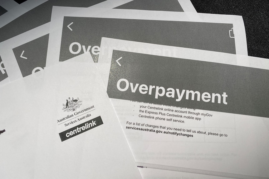 black and white letters with big writing saying overpayment