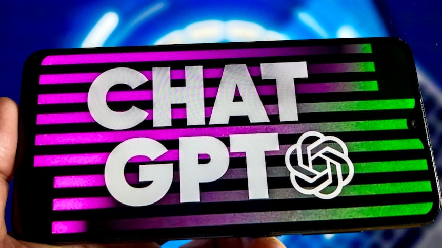 A hand holding a phone with a ChatGPT logo