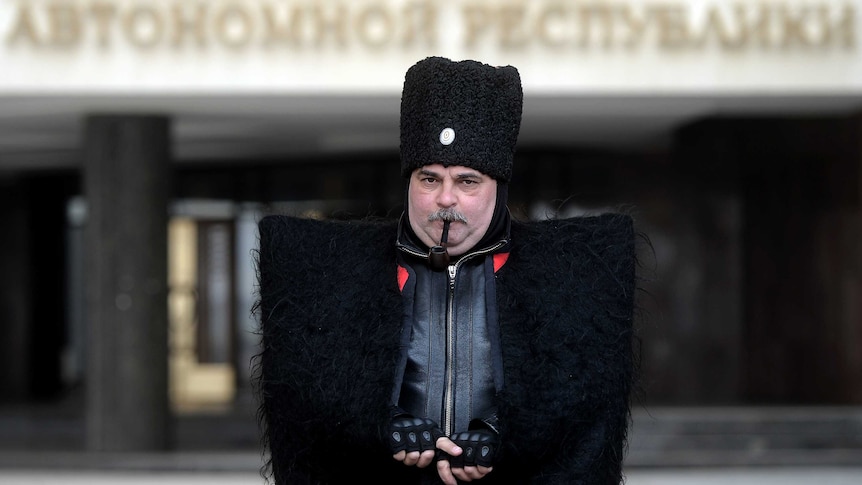 Cossack guard in front of Crimea's regional parliament building