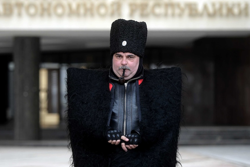 Cossack guard in front of Crimea's regional parliament building