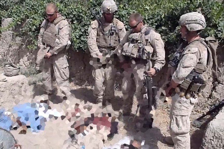YouTube footage allegedly showing US marines urinating on the corpses of Taliban fighters.