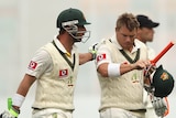 Hughes, Warner survive second session