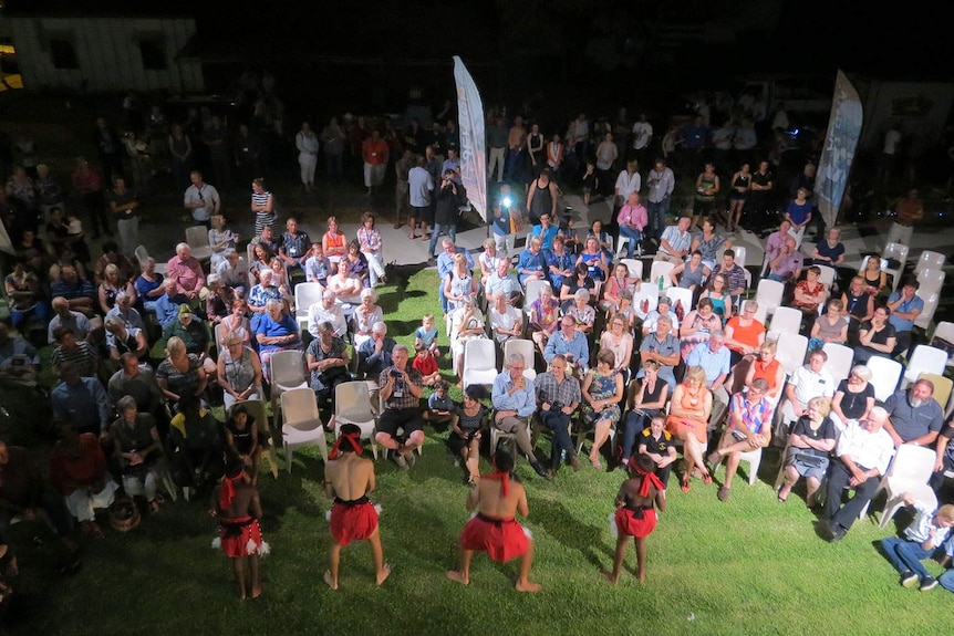 Indigenous dancers entertain the crowd at the official unveiling of the redeveloped historic Globe Hotel in Barcaldine