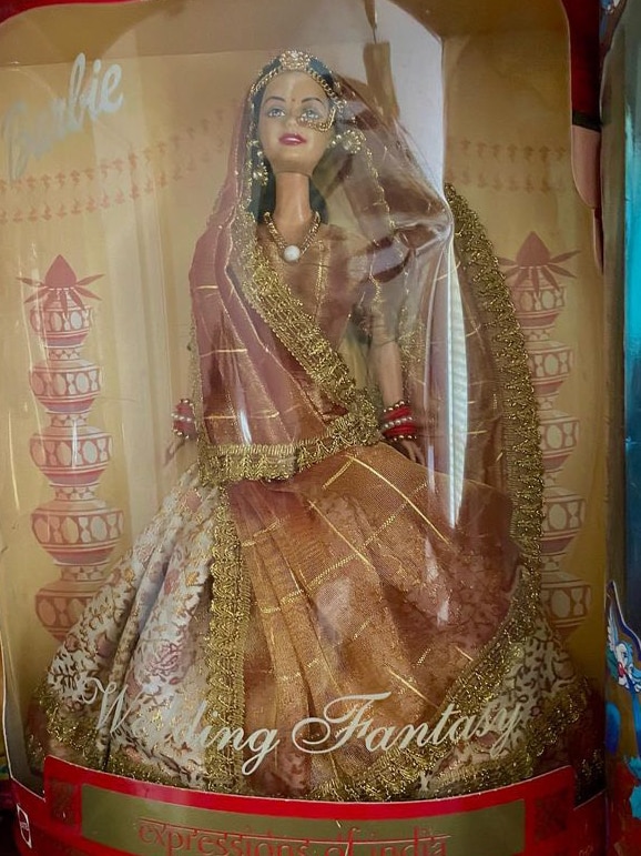 An Indian wedding Barbie doll inside its box