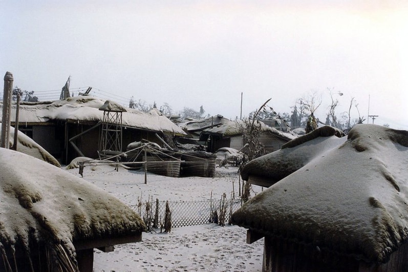 Ash on the roofs of houses in Rabaul