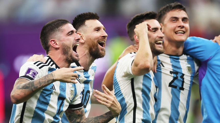 Lionel Messi and Argentina players celebrate their FIFA WOrld Cup semifinal win over Croatia.