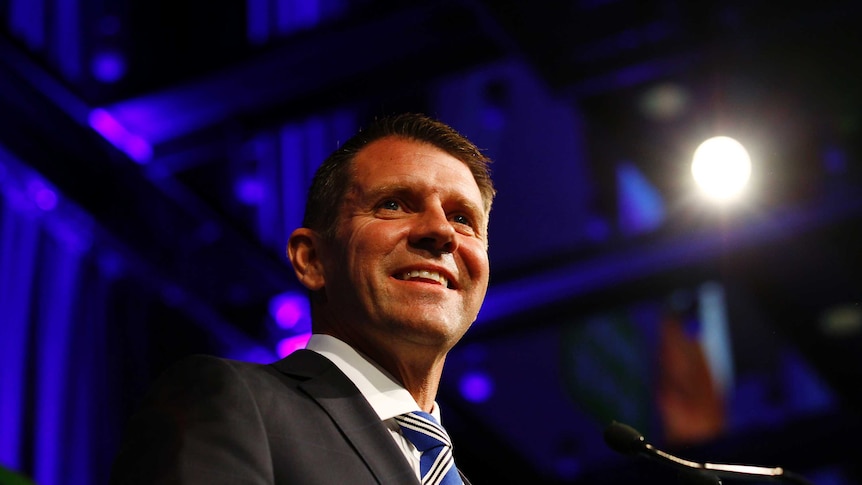 NSW Premier Mike Baird takes the stage after claiming victory in the NSW state election