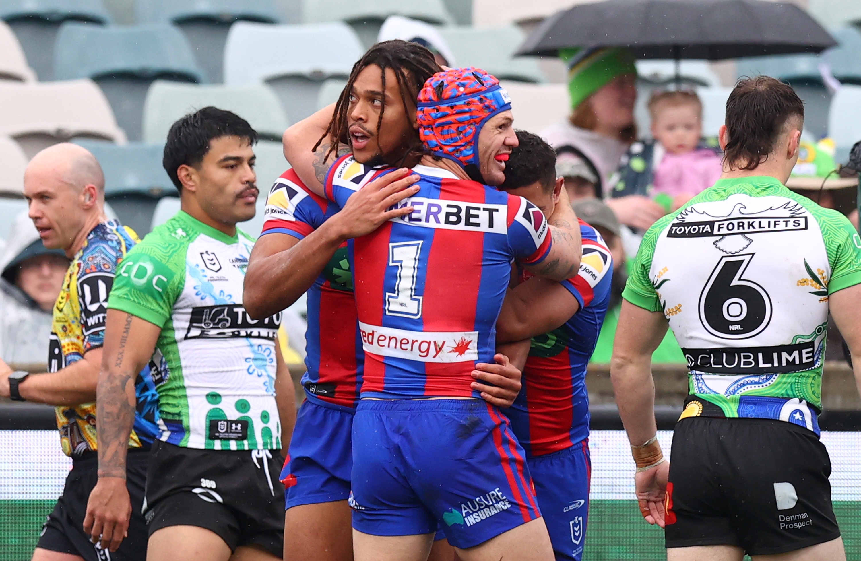 Live: Knights and Raiders trade blows in the Canberra wet