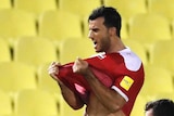 Syria's Firas Mohamad Alkhatib celebrates equaliser against Socceroos
