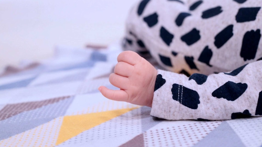 Nearly a quarter of sudden unexpected deaths in Queensland infants occur in homes known to child protection, report finds