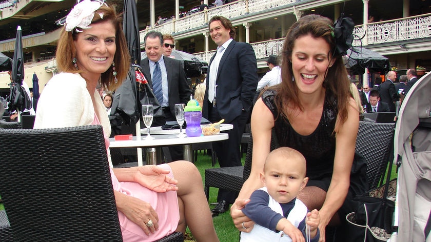 A young race fan dressed up to enjoy the Melbourne Cup at Randwick