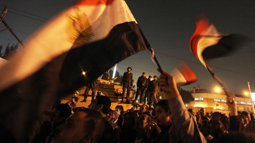 Egyptian army soldiers monitor protests