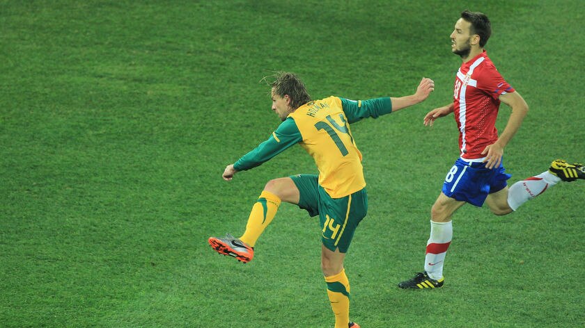 Wondergoal: Brett Holman was left in acres of space as he smashed home Australia's second from 30 yards.