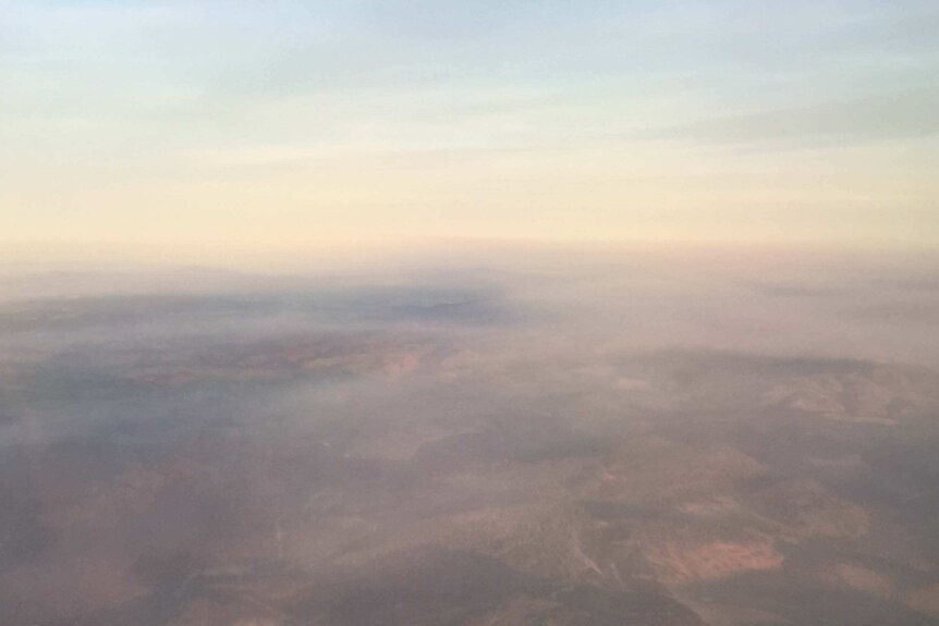 Smoke blankets southern Tasmania with several fires burning out of control.