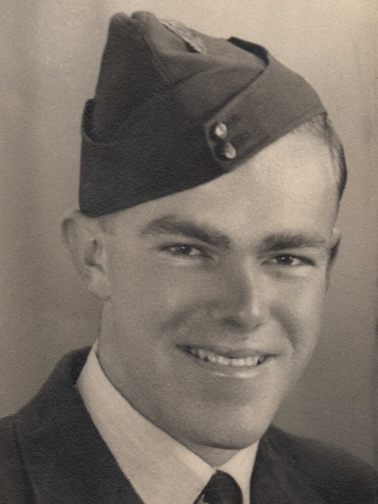 Black and white photo of a young man in RAAF uniform.