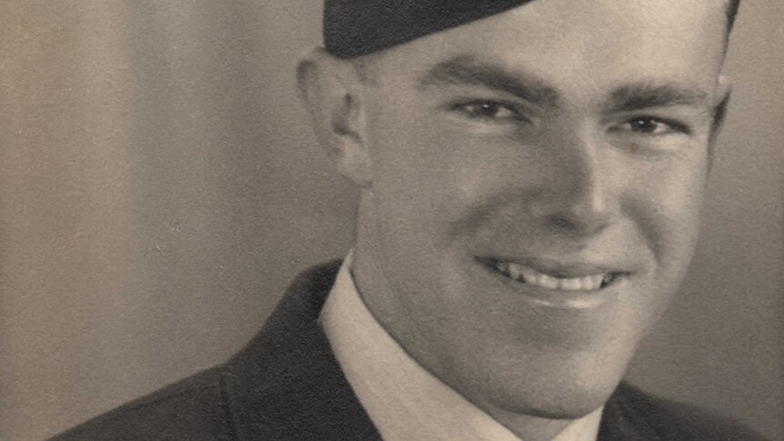 Black and white photo of a young man in RAAF uniform.