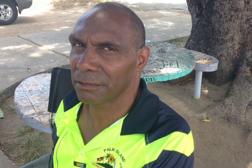 Headshot of Lex Wotton standing under a tree on Palm Island.