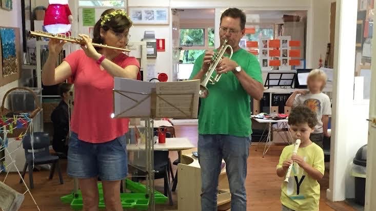 Anthony Heinrichs and his wife Bridget Bolliger practise with their son Luca on the recorder