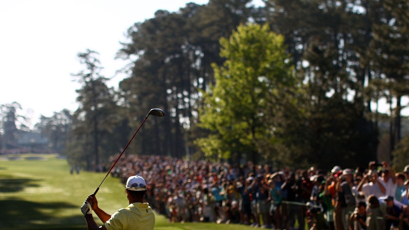 Woods tees off at Augusta