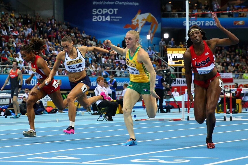 American Nia Ali (R) beats Australia's Sally Pearson in the final of the World Indoor 60m hurdles